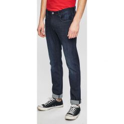 Armani Exchange - Jeansy. Niebieskie jeansy męskie Armani Exchange. W wyprzedaży za 299.90 zł.