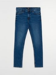 Jeansy skinny z efektem sprania - granatowy. Niebieskie jeansy męskie Sinsay. Za 59.99 zł.