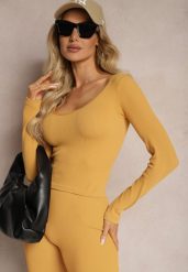 Żółta Dopasowana Bluzka w Prążki o Krótkim Kroju Elowenia. Żółte bluzki damskie Renee, bez wzorów, sportowe, bez kołnierzyka, bez ramiączek. Za 44.99 zł.