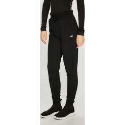 Tommy Jeans - Spodnie. Szare spodnie materiałowe damskie marki Tommy Jeans, z bawełny. W wyprzedaży za 239.90 zł.