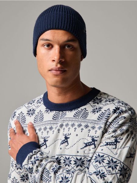 Czapka beanie - granatowy. Niebieskie czapki i kapelusze męskie Sinsay, bez wzorów. Za 9.99 zł.