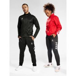 Spodnie dresowe piłkarskie męskie Hummel Core XK Training Poly Pants. Czarne krótkie spodenki sportowe męskie Hummel, m, bez wzorów, z dresówki, do piłki nożnej. Za 134.00 zł.