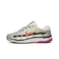 Buty do chodzenia damskie Nike W P6000. Białe obuwie sportowe damskie Nike, bez wzorów, z gumy, do biegania. Za 504.45 zł.