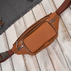 Saszetka nerka męska skórzana klasyczna na pas koniakowa Abruzzo ABR-41-CG. Szare saszetki męskie ze skóry, eleganckie. Za 89.00 zł.