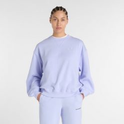 Bluza damska New Balance WT41500DYK – fioletowa. Fioletowe bluzy damskie New Balance, xs, bez wzorów, z bawełny, bez kaptura. Za 339.99 zł.