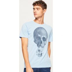 T-shirt z nadrukiem - Niebieski. Niebieskie t-shirty męskie Reserved, z nadrukiem. Za 29.99 zł.