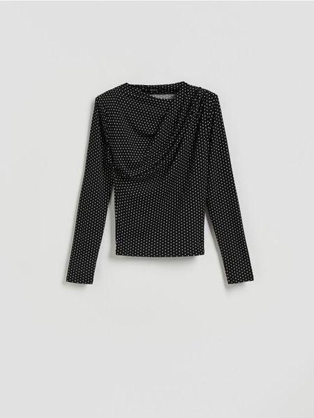 Bluzka w kropki - czarny. Czarne bluzki damskie Reserved, l, bez wzorów, z dzianiny, bez kołnierzyka, bez ramiączek. Za 99.99 zł.
