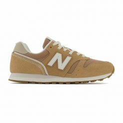 Damskie trampki na co dzień New Balance 373 v2 Kobieta. Brązowe trampki i tenisówki damskie New Balance, bez wzorów, z materiału, bez zapięcia. Za 397.00 zł.