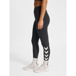 Damskie legginsy Hummel Pulse Logo MW. Czarne legginsy sportowe damskie Hummel, bez wzorów, na fitness i siłownię. Za 149.00 zł.