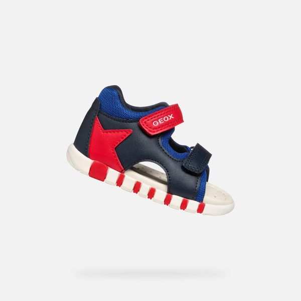 Sandały GEOX B SANDAL IUPIDOO BOY Niebieski. Niebieskie sandały męskie Geox, z materiału, bez zapięcia. Za 128.99 zł.