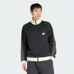 BLUZA DRESOWA Z PIKI O STANDARDOWYM KROJU STADIUM. Białe bluzy męskie Adidas, m, bez wzorów, z bawełny, bez kaptura. Za 349.00 zł.