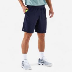 Spodenki tenisowe męskie Kuikma Dry. Niebieskie krótkie spodenki sportowe męskie KUIKMA, l, bez wzorów, z materiału, tenisowe. Za 69.99 zł.