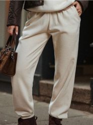 Spodnie dresowe jogger - kremowy. Białe spodnie dresowe damskie Sinsay, l, bez wzorów, z dresówki. Za 29.99 zł.