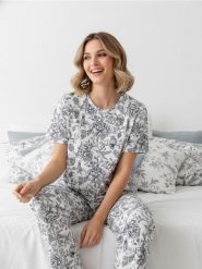 Dwuczęściowa piżama z motywem kwiatów i ptaków - kremowy. Białe piżamy damskie Sinsay, l, bez wzorów, bez ramiączek. Za 49.99 zł.