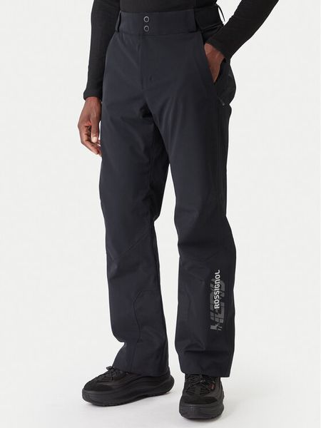 Rossignol Spodnie narciarskie Hero RLOMP15 200 BLACK Czarny Regular Fit. Czarne spodnie snowboardowe męskie Rossignol, m, bez wzorów, z syntetyku, narciarskie. Za 1,449.00 zł.