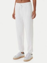 Guess Spodnie dresowe V6GB11 K3095 Biały Regular Fit. Białe spodnie dresowe damskie Guess, xs, z aplikacjami, z dresówki. Za 294.99 zł.