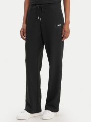 DKNY Sport Spodnie dresowe DP6P3794 Czarny Regular Fit. Czarne spodnie dresowe damskie DKNY Sport, l, bez wzorów, z dresówki. Za 309.99 zł.