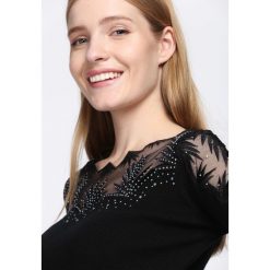 Czarny Sweter Do Not Wait. Czarne swetry damskie marki Born2be, z dzianiny. Za 79.99 zł.