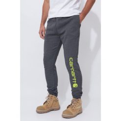 Spodnie męskie dresowe Carhartt Midweight Graphic Jogger. Szare spodnie sportowe męskie Carhartt, l, bez wzorów, z dresówki, trekkingowe. Za 335.99 zł.