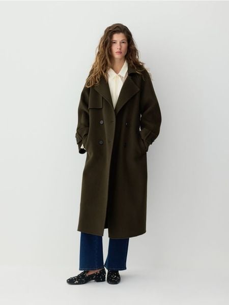 Wełniany płaszcz handmade - ciemnozielony. Zielone płaszcze damskie Reserved, l, bez wzorów, z tkaniny, bez kaptura. Za 699.99 zł.