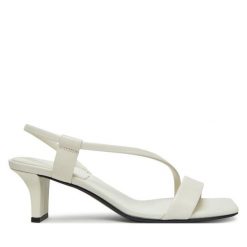Sandały Calvin Klein. Białe sandały damskie Calvin Klein, bez wzorów, bez obcasa, na słupku, bez zapięcia. Za 319.99 zł.