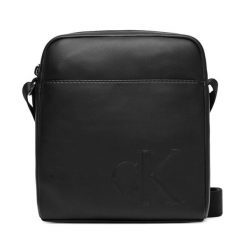 Saszetka Calvin Klein. Czarne saszetki męskie Calvin Klein, młodzieżowe, małe. Za 209.99 zł.
