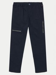 Tommy Hilfiger Spodnie materiałowe Utility KB0KB09122 Granatowy Regular Fit. Niebieskie spodnie materiałowe dla chłopców Tommy Hilfiger, bez wzorów, z bawełny. Za 229.99 zł.