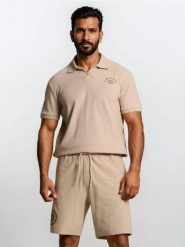 Bawełniane szorty z nadrukiem Smiley - beżowy. Brązowe szorty męskie Sinsay, l, bez wzorów, z bawełny. Za 39.99 zł.