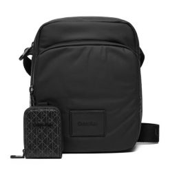 Saszetka Calvin Klein. Czarne saszetki męskie Calvin Klein, młodzieżowe, małe. Za 369.99 zł.