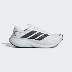 BUTY DO BIEGANIA SUPERNOVA GLIDE W. Białe obuwie sportowe damskie Adidas, bez wzorów, z gumy, do biegania. Za 629.60 zł.