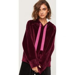Bluza o aksamitnym wykończeniu - Fioletowy. Bluzy damskie marki KALENJI. W wyprzedaży za 69.99 zł.