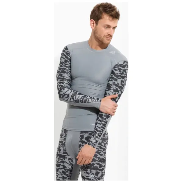 Adidas Koszulka Ls Tf Tee Ls Ci Gx. , szary, rozmiar M. Szare koszulki sportowe męskie Adidas, m, bez wzorów, z materiału, bez kołnierzyka, bez ramiączek, na fitness i siłownię, climalite (adidas). W wyprzedaży za 139.99 zł.