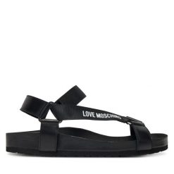 Sandały LOVE MOSCHINO. Czarne sandały damskie Love Moschino, bez wzorów, bez obcasa, na płaskiej podeszwie, bez zapięcia. Za 529.99 zł.