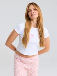 Bawełniana piżama dwuczęściowa z haftem Barbie - biały. Białe piżamy damskie Sinsay, l, bez wzorów, z bawełny, bez ramiączek. Za 59.99 zł.