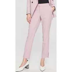 Eleganckie spodnie - Fioletowy. Spodnie materiałowe damskie marki Reserved. W wyprzedaży za 49.99 zł.