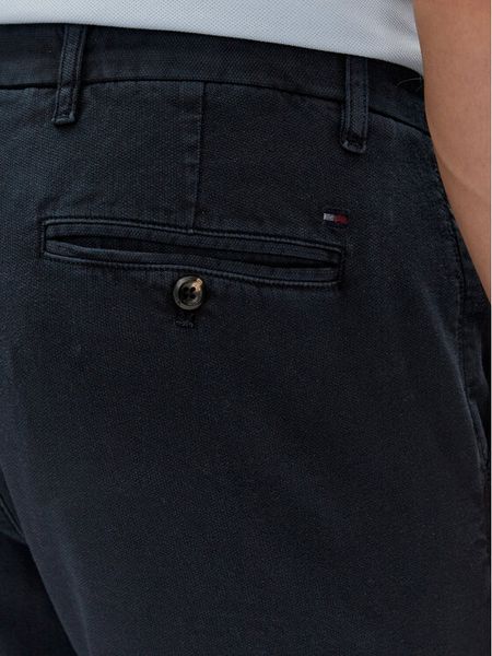 Tommy Hilfiger Chinosy Bleecker MW0MW33910 Granatowy Slim Fit. Niebieskie eleganckie spodnie męskie Tommy Hilfiger, m, bez wzorów, z bawełny. Za 319.99 zł.