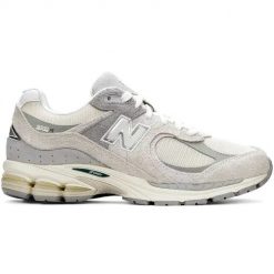 New Balance M2002REK Sneakersy unisex. Szare obuwie sportowe damskie New Balance, bez wzorów, ze skóry, trekkingowe. W wyprzedaży za 559.20 zł.