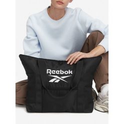 Torebka Reebok. Czarne torebki do ręki damskie Reebok, bez wzorów, bez dodatków. Za 79.99 zł.
