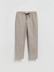 Spodnie carrot z wiązaniem - beżowy. Brązowe spodnie materiałowe męskie Reserved, l, bez wzorów, z tkaniny. Za 149.99 zł.