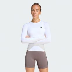Bluzka z długim rękawem PrimeLift Essentials Workout Contour. Białe bluzki damskie Adidas, bez wzorów, sportowe, bez kołnierzyka, bez ramiączek. Za 149.00 zł.