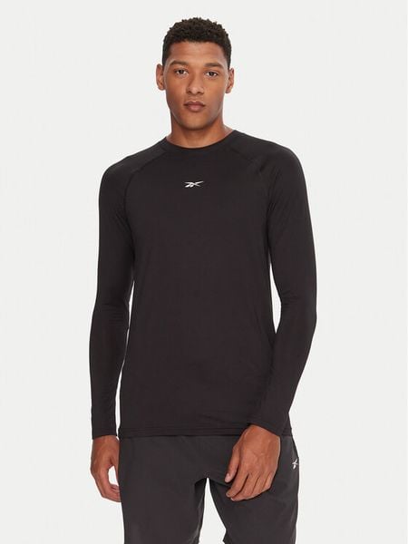 Reebok Koszulka techniczna Ls Muscle Tee RK25176CCM Czarny Regular Fit. Czarne koszulki sportowe męskie Reebok, m, bez wzorów, z syntetyku, bez kołnierzyka, bez ramiączek, na fitness i siłownię. Za 69.99 zł.