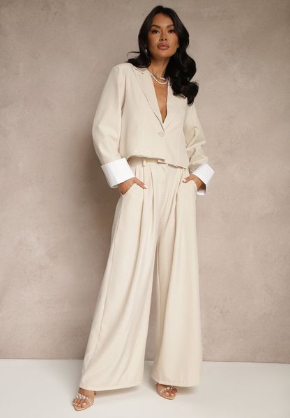 Beżowy Garniturowy Komplet Marynarka i Spodnie z Kontrastującymi Zdobieniami Davirielle. Brązowe spodnie materiałowe damskie Renee, z aplikacjami, eleganckie. Za 169.99 zł.