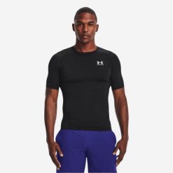 Koszulka męska Under Armour HeatGear® krótki rękaw. Czarne koszulki sportowe męskie Under Armour, l, bez wzorów, z materiału, bez kołnierzyka, bez ramiączek, na fitness i siłownię. Za 119.99 zł.
