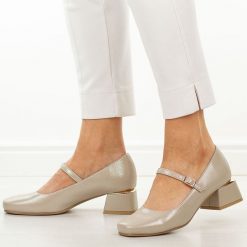 Złote czółenka damskie na obcasie Potocki 12815. Żółte czółenka damskie POTOCKI, bez wzorów, ze skóry, eleganckie, bez obcasa, na obcasie, bez zapięcia. Za 179.00 zł.