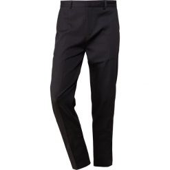 LibertineLibertine TRANSWORLD Spodnie materiałowe black. Spodnie materiałowe męskie Libertine-Libertine, z bawełny. Za 569.00 zł.
