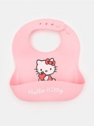 Silikonowy śliniak Hello Kitty - różowy. Czerwone śliniaki dla dzieci Sinsay, bez wzorów. Za 12.99 zł.