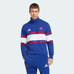 Bluza z krótkim suwakiem Francja Rugby Travel. Niebieskie bluzy męskie Adidas, l, bez wzorów, z bawełny, bez kaptura. Za 399.00 zł.