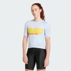 Koszulka Do Jazdy Na Rowerze Tempo Neo Heritage. Niebieskie koszulki sportowe damskie Adidas, bez wzorów, bez kołnierzyka, bez ramiączek, rowerowe. Za 439.00 zł.