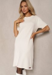 Biała T-shirtowa Sukienka z Wiskozowej Dzianiny z Ozdobnymi Guzikami Narossa. Białe sukienki damskie Renee, na spotkanie biznesowe, l, bez wzorów, z dzianiny, eleganckie, bez kołnierzyka, bez ramiączek, mini. Za 59.99 zł.