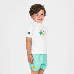 Szorty kąpielowe dla malucha Nabaiji Wave. Zielone szorty dla chłopców NABAIJI, bez wzorów, z materiału, sportowe. W wyprzedaży za 24.99 zł.